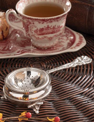 A Royal Pour Brass Tea Strainer 33724 by Victorian Trading Co